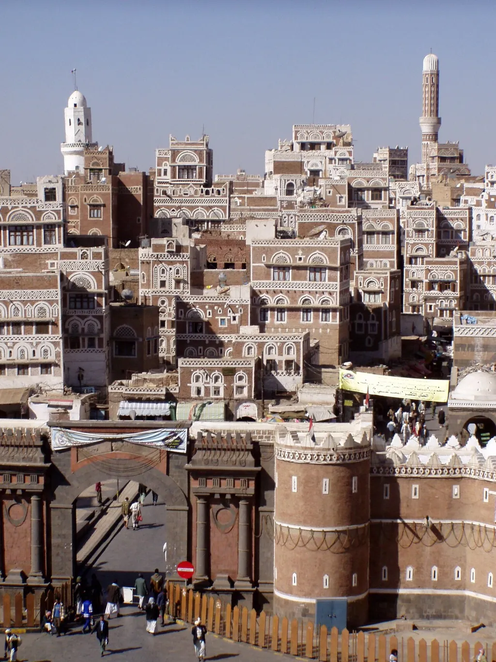 Bab al-Yemen gate and the tower-house skyline of Sanaa's old city, Yemen