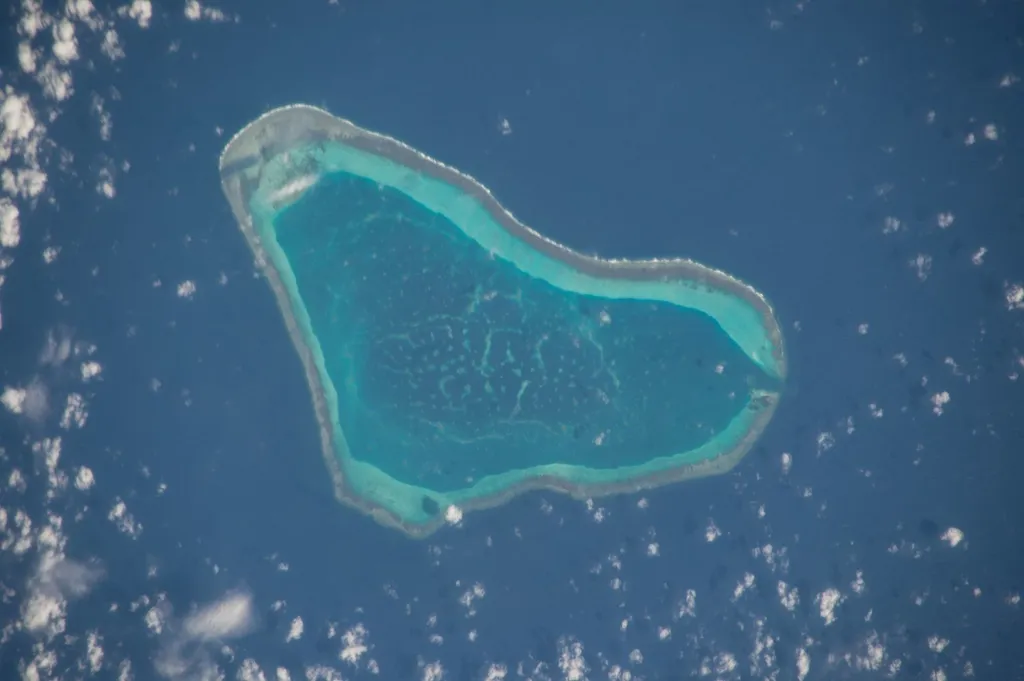 Aerial view of Scarborough Shoal, the disputed triangular atoll and lagoon in the South China Sea