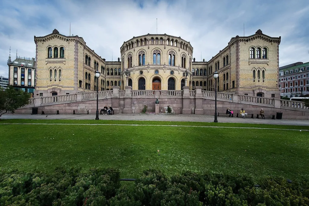 The Stortinget, Norway's yellow-brick parliament building in Oslo, fronted by Eidsvolls plass.