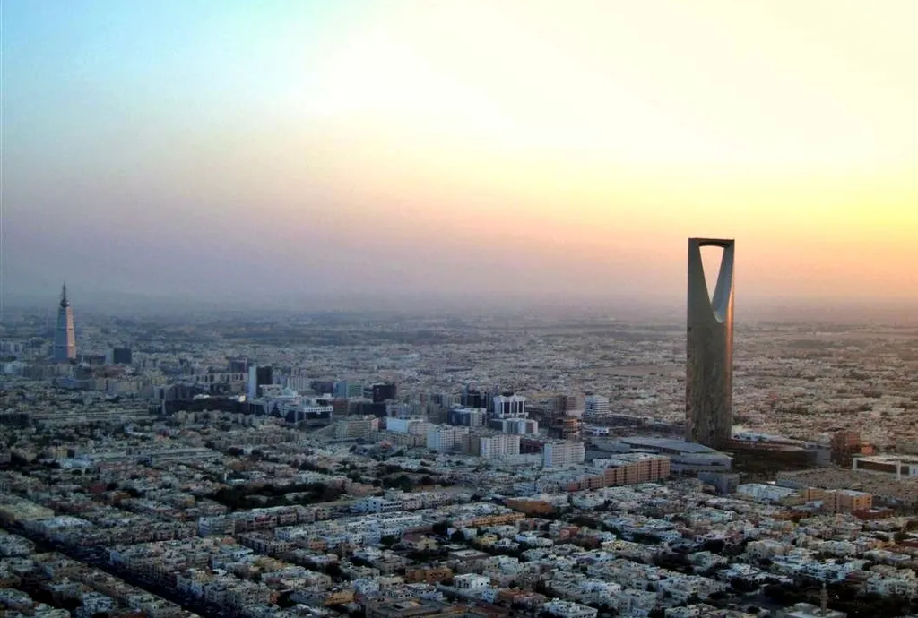 Riyadh skyline at sunset with the Kingdom Centre tower on the right