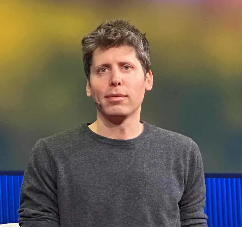 OpenAI CEO Sam Altman speaking on stage at TED in April 2025