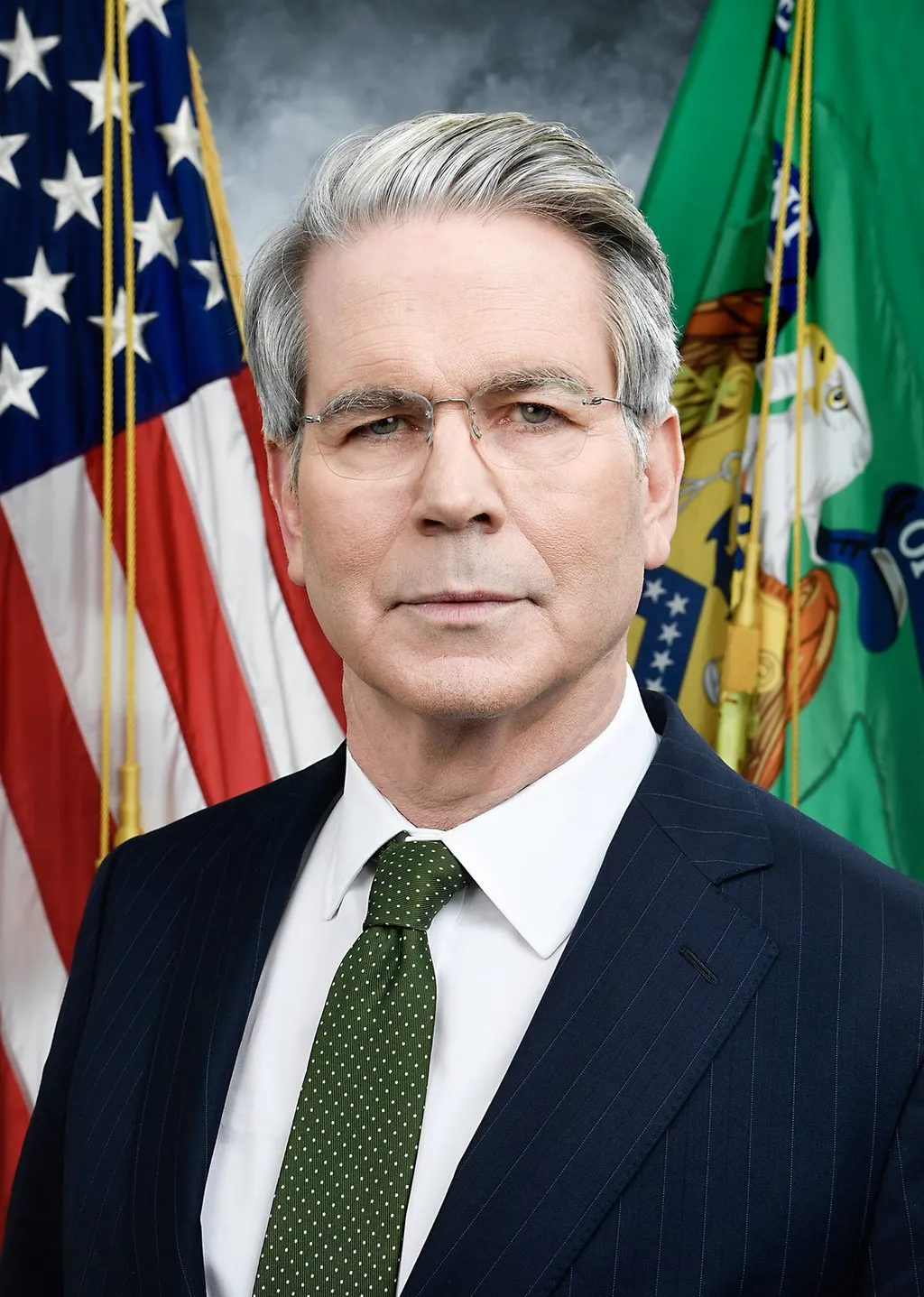US Treasury Secretary Scott Bessent in an official portrait, standing before the US and Treasury flags