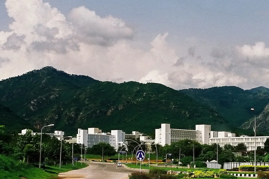 Federal government secretariat buildings in Islamabad, Pakistan, with the Margalla Hills behind