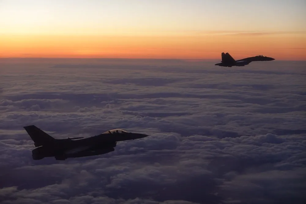 A Russian Su-35 Flanker photographed at sunset by a NORAD F-16 during an intercept over the Bering Sea (file photo)