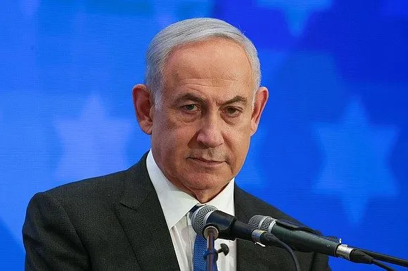 Benjamin Netanyahu speaking at a podium