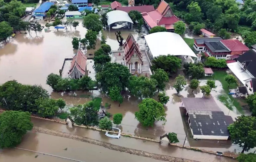Aerial view of floodwater surrounding Thai temples and homes in flood-hit provinces