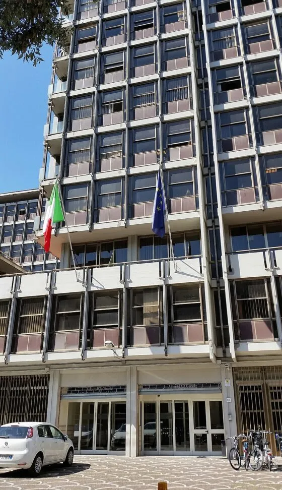 The AGCM (Italy's competition and market authority) headquarters in Rome, flying the Italian and EU flags