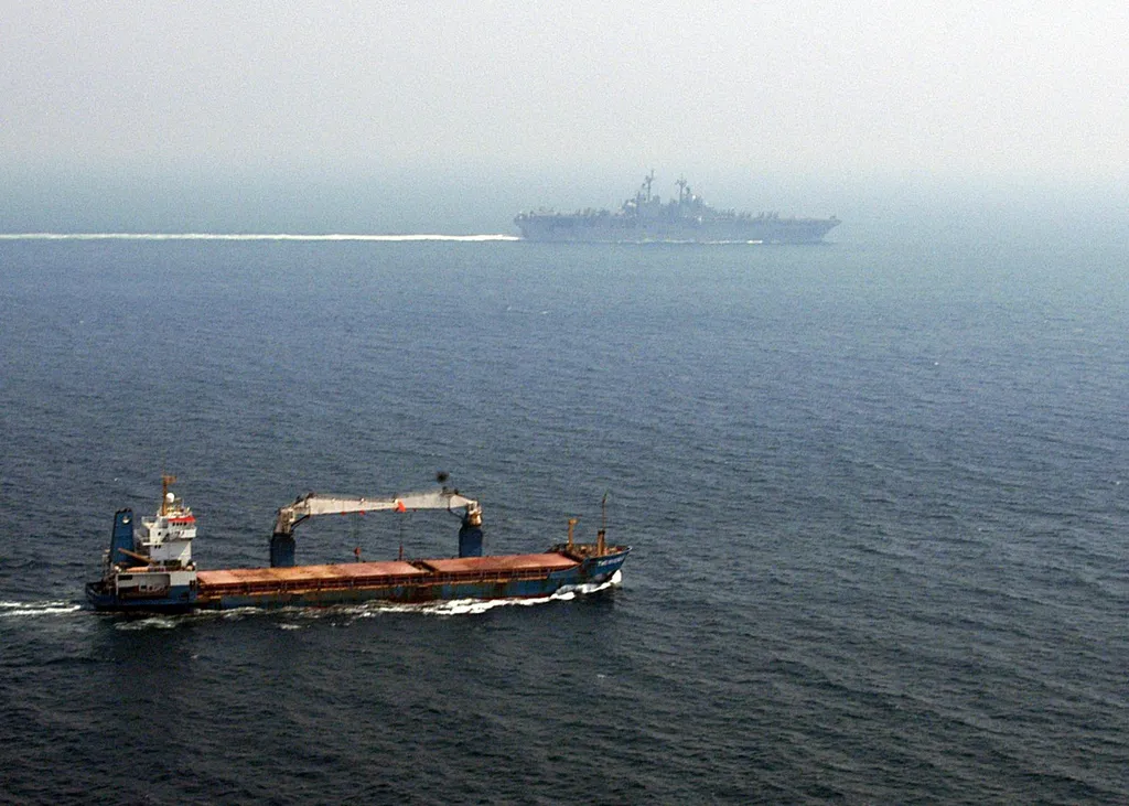 A merchant ship transits the Strait of Hormuz (file photo, 2004)