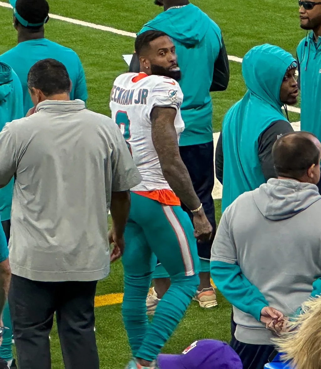 Odell Beckham Jr. walking on the sideline in a Miami Dolphins jersey during the game against the Indianapolis Colts on 20 October 2024