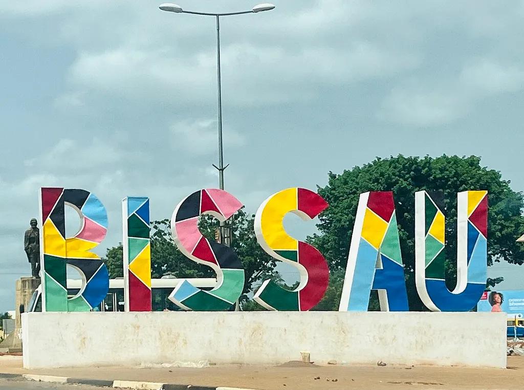 Colourful BISSAU city sign — large mosaic letters spelling out the name of Guinea-Bissau's capital