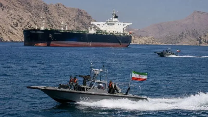 IRGC patrol boats alongside an oil supertanker in the Strait of Hormuz