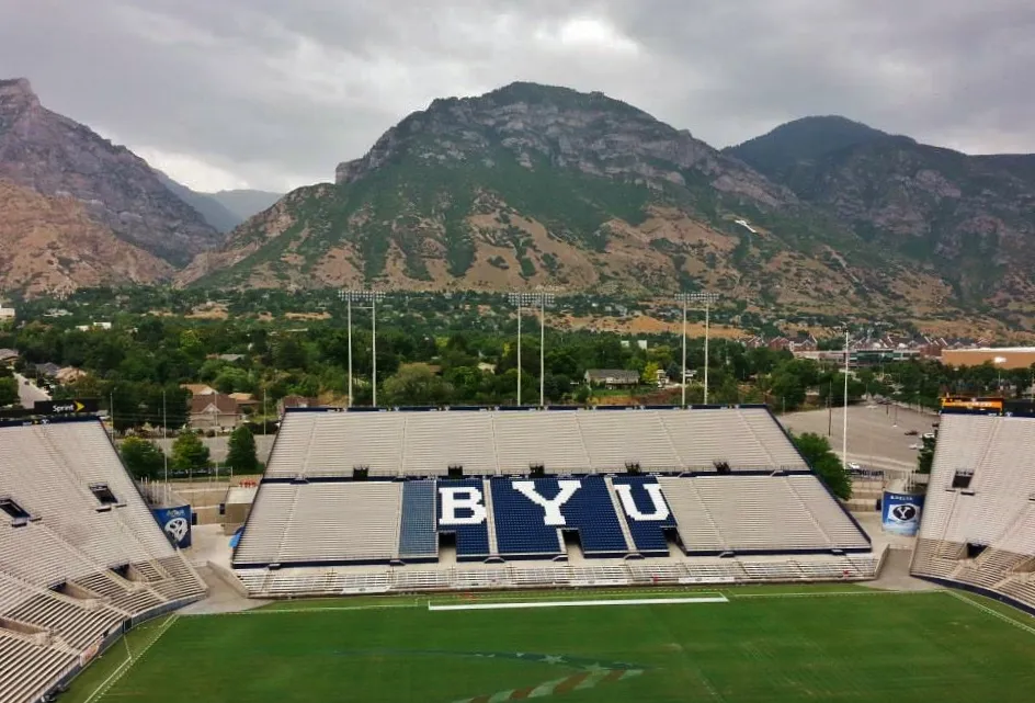 Interior of LaVell Edwards Stadium in Provo, Utah (photo: Pastelitodepapa, CC0 via Wikimedia Commons); a view of the stadium, not the final play.