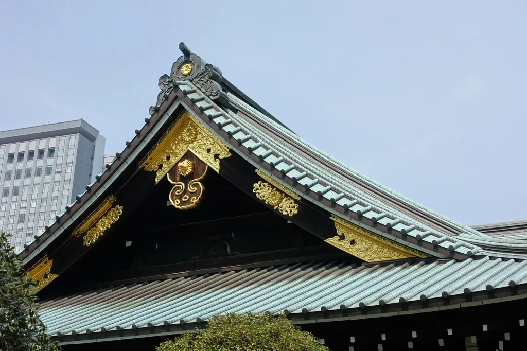 Haiden, the main worship hall, and the central torii gate of Yasukuni Shrine in Tokyo