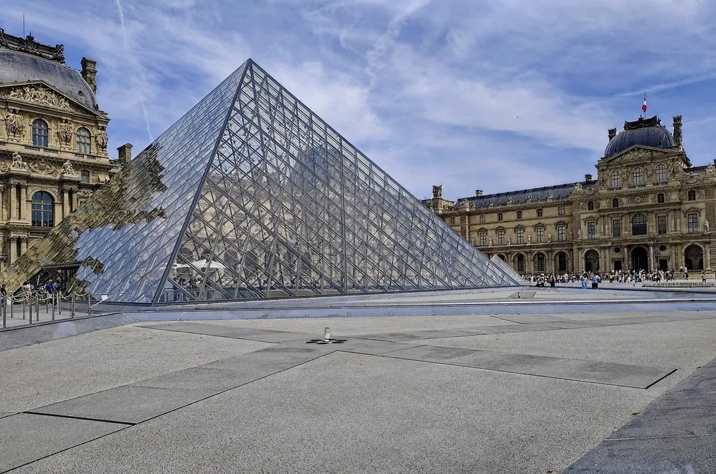 The Louvre glass pyramid in the Cour Napoleon courtyard, Paris