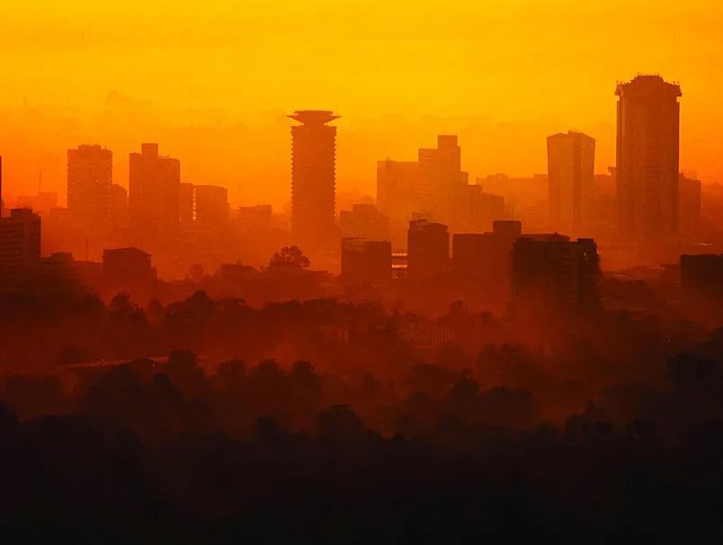 Nairobi skyline at dusk with the Kenyatta International Convention Centre tower