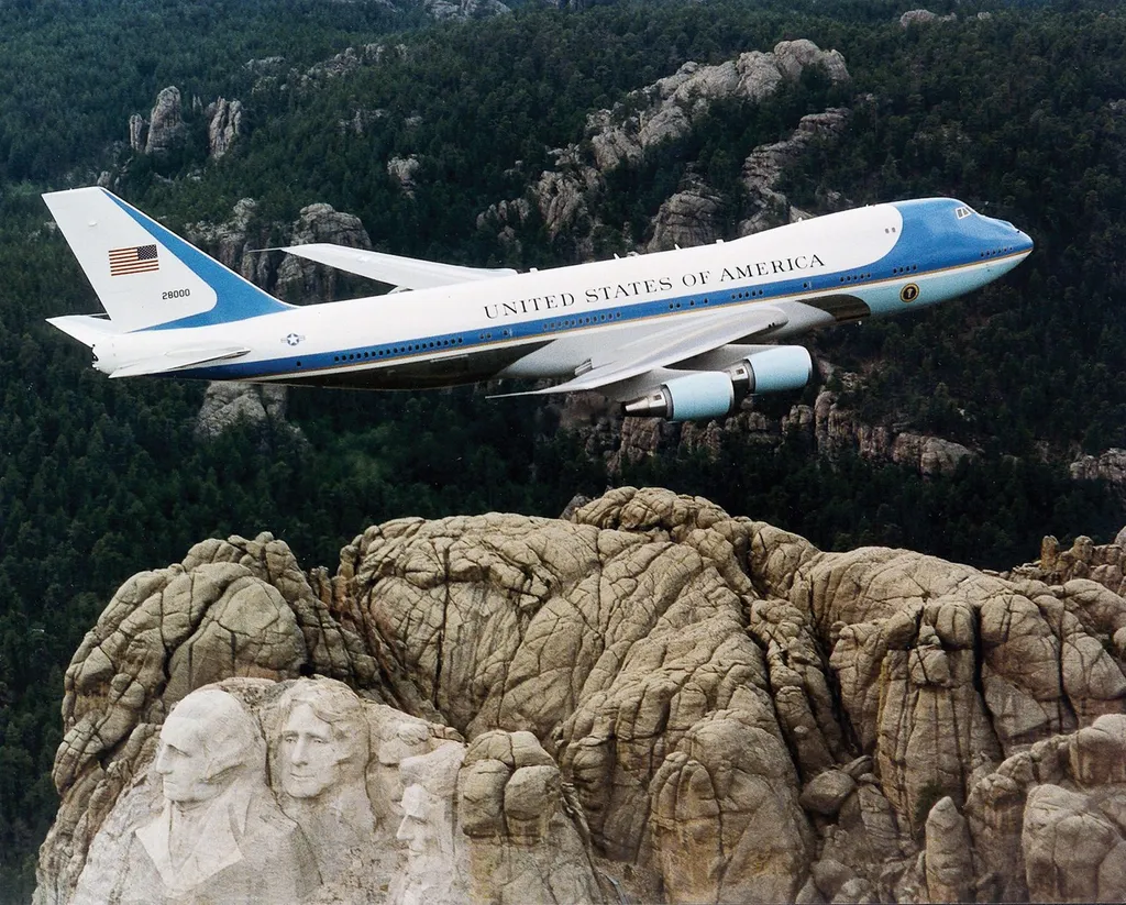 Air Force One, a Boeing VC-25A in United States of America livery, in flight over Mount Rushmore