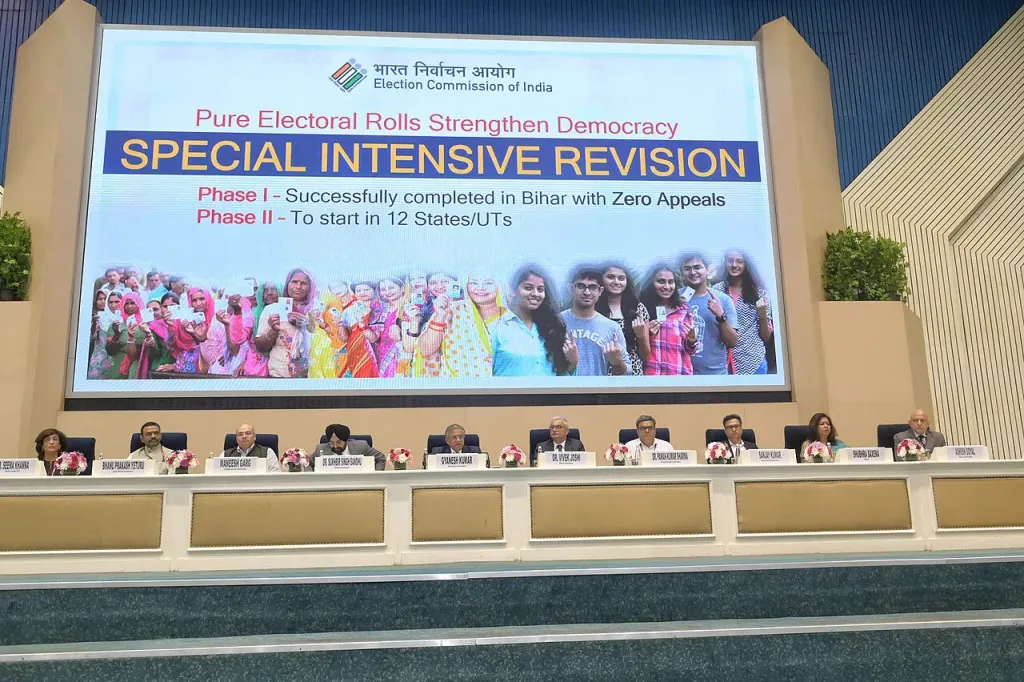 Election Commission of India officials at a press conference in New Delhi behind a 'Special Intensive Revision' banner about the electoral-roll revision