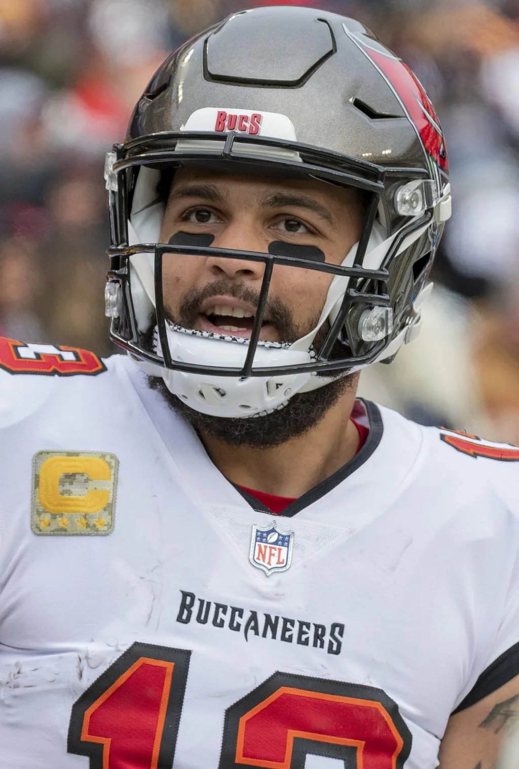 Mike Evans in a Tampa Bay Buccaneers uniform and helmet