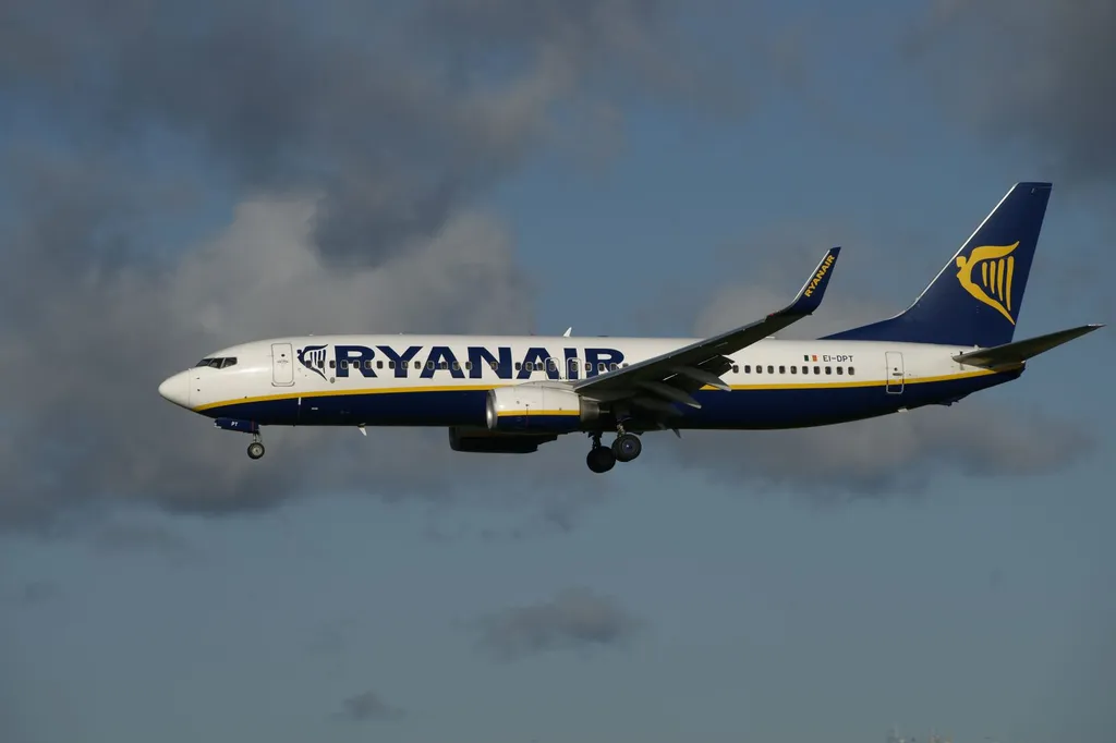 A Ryanair Boeing 737-800 in the airline's blue and yellow livery on approach to land