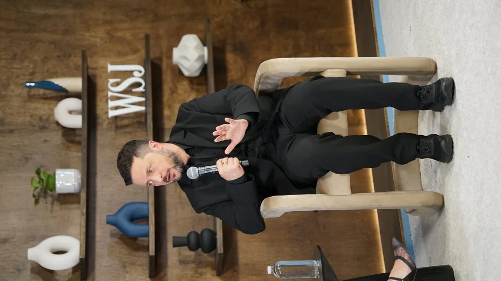 Volodymyr Zelenskyy speaking with a microphone at Journal House in New York, September 2026
