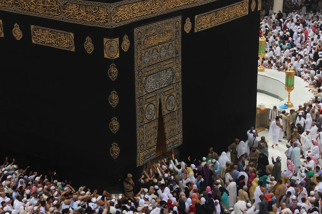 Pilgrims gathered at the Kaaba in the Grand Mosque, Makkah.