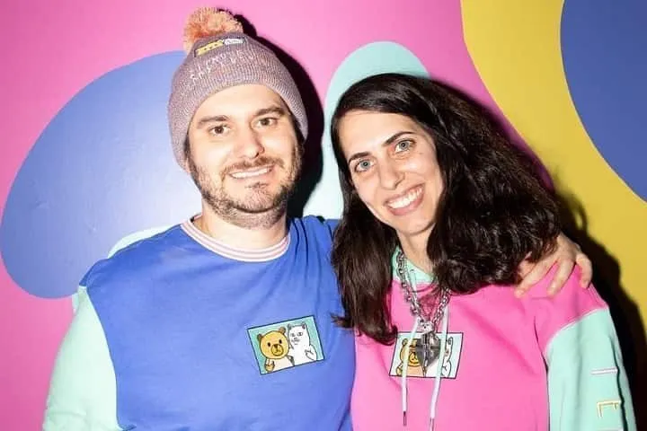 Ethan Klein and Hila Klein posing together