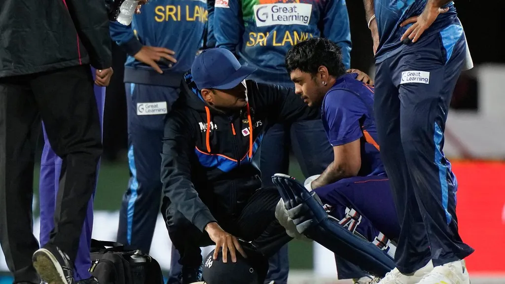 Ishan Kishan receiving on-field treatment during a T20I match