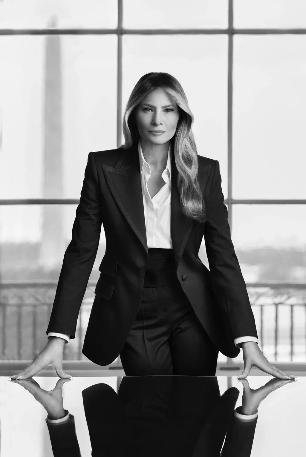 Official 2025 White House portrait of First Lady Melania Trump (black-and-white), leaning over a table