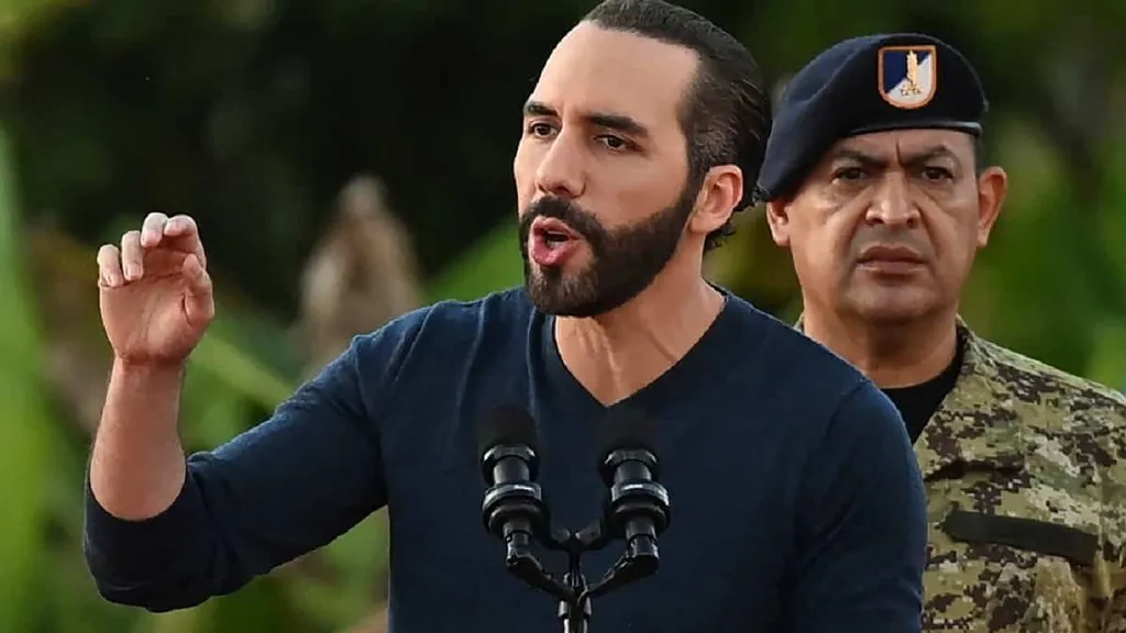 El Salvador President Nayib Bukele speaking at a podium outdoors