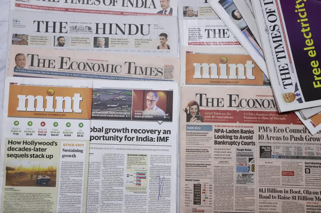 Indian newspapers including The Times of India, The Hindu, The Economic Times and Mint laid out together