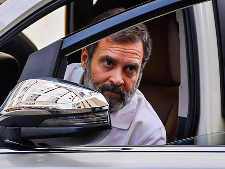 Rahul Gandhi seated inside a car in a convoy