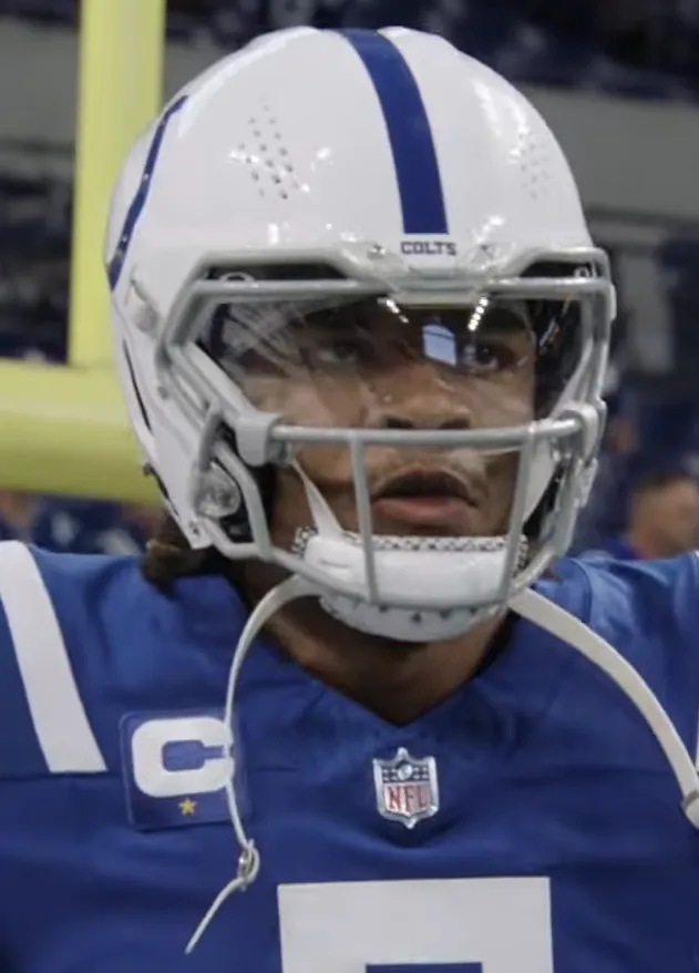 Indianapolis Colts quarterback Anthony Richardson Sr. in a white Colts helmet and blue number 5 jersey during the 2023 NFL season