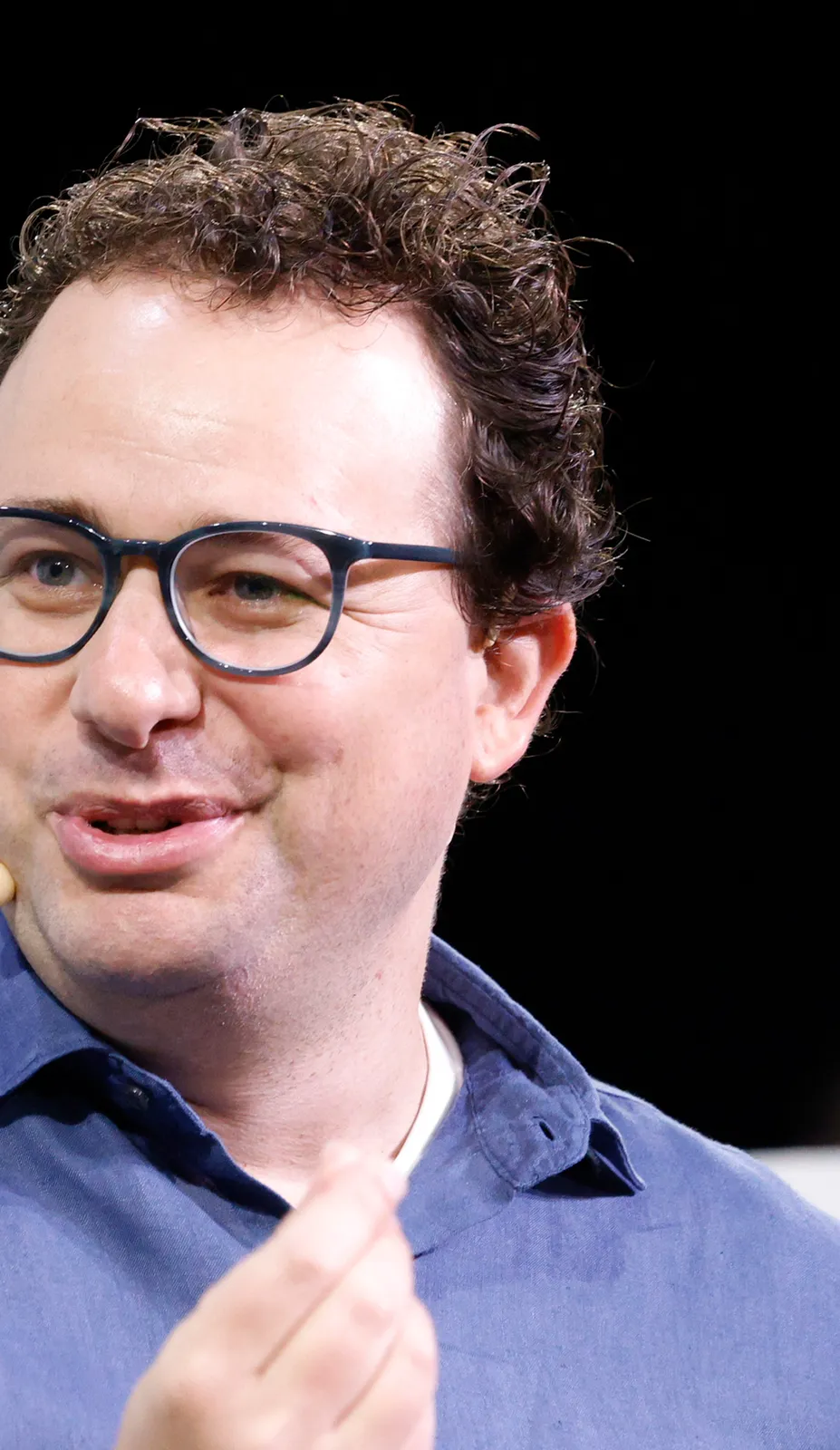 Anthropic CEO Dario Amodei speaking on stage at TechCrunch Disrupt in San Francisco, 2023