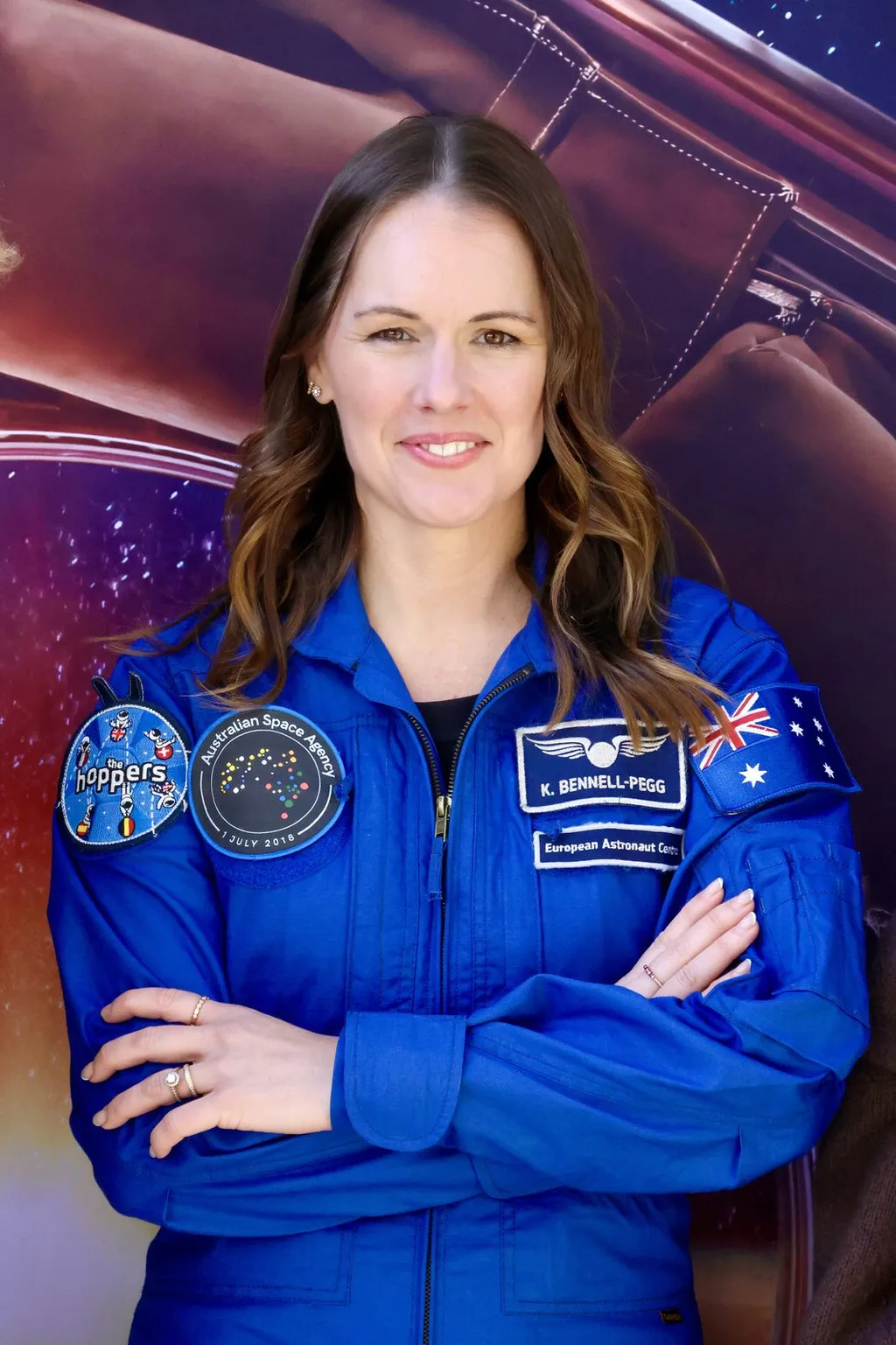 Katherine Bennell-Pegg speaking at a podium during the Australian Space Discovery Centre's Space Day Out event, July 2026