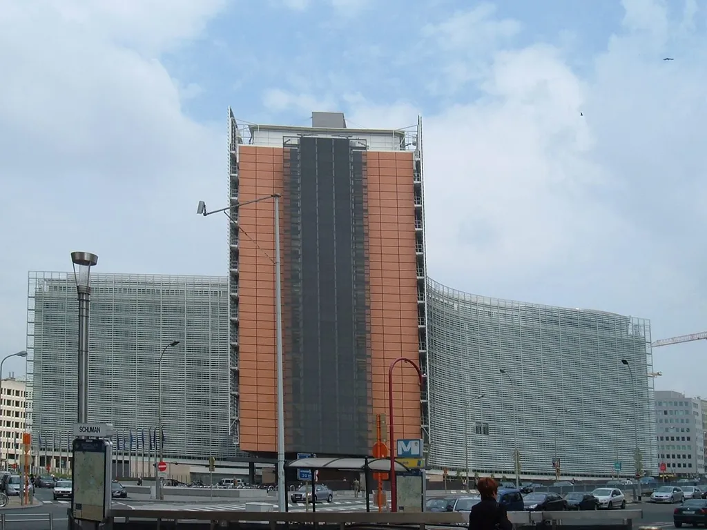 The Berlaymont building in Brussels, headquarters of the European Commission, seen from street level with its distinctive glass facade