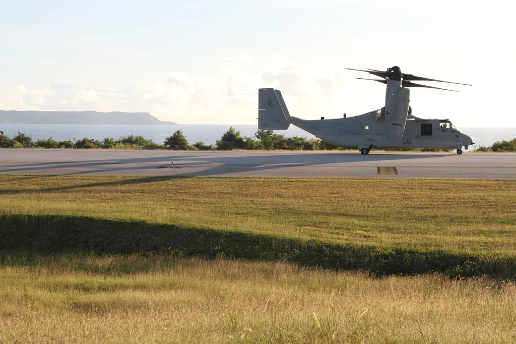 A US Marine Corps MV-22B Osprey tiltrotor aircraft taxiing on a runway