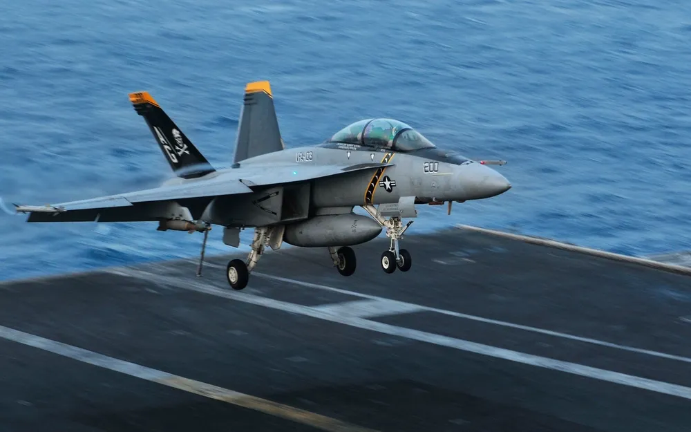A US Navy F/A-18 Super Hornet of Strike Fighter Squadron 143 landing on the aircraft carrier USS Dwight D. Eisenhower; the F/A-XX will replace the Super Hornet fleet.