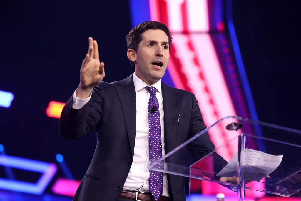 Calley Means, the Make America Healthy Again adviser, speaking at a podium during AmericaFest 2024 in Phoenix, Arizona.