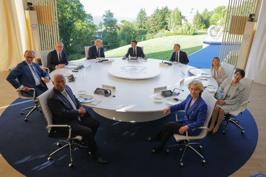 G7 leaders, including French President Emmanuel Macron and Canadian Prime Minister Mark Carney, pose for a group photo at the 2026 G7 Leaders Summit in Evian, France, June 2026.