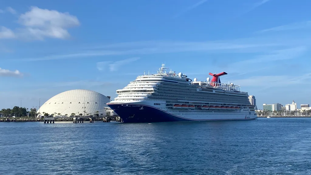 The Carnival Panorama cruise ship, name visible on the bow, docked at Long Beach, California, in December 2025.