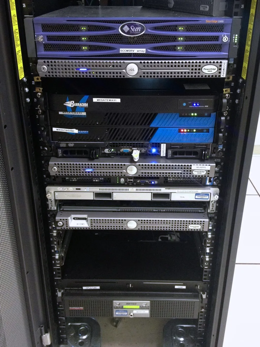 Representative photograph of a server rack with rack-mounted equipment in a data centre; not the Taloja campus.