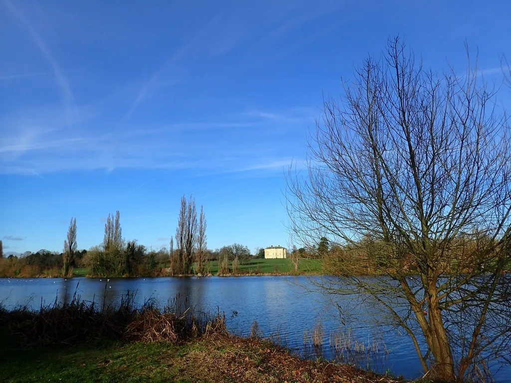 Danson Park Lake in Bexley, south-east London, with Danson House visible in the distance across the water; police carried out specialist water searches in the park during the investigation into Nazire Koreli's disappearance