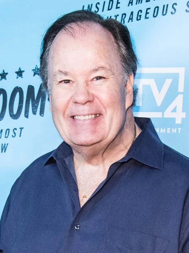 Dennis Haskins smiling at the Lucha VaVOOM premiere in Los Angeles in October 2018.