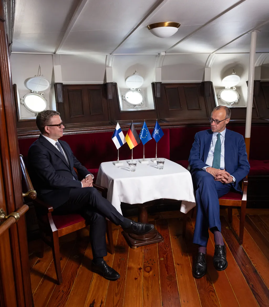 German Chancellor Friedrich Merz (right) shaking hands with Finnish Prime Minister Petteri Orpo in Turku, Finland, on 27 May 2025