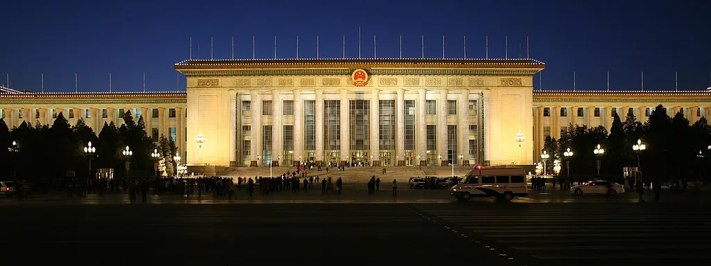 The Great Hall of the People in Beijing illuminated at night, seat of the National Peoples Congress