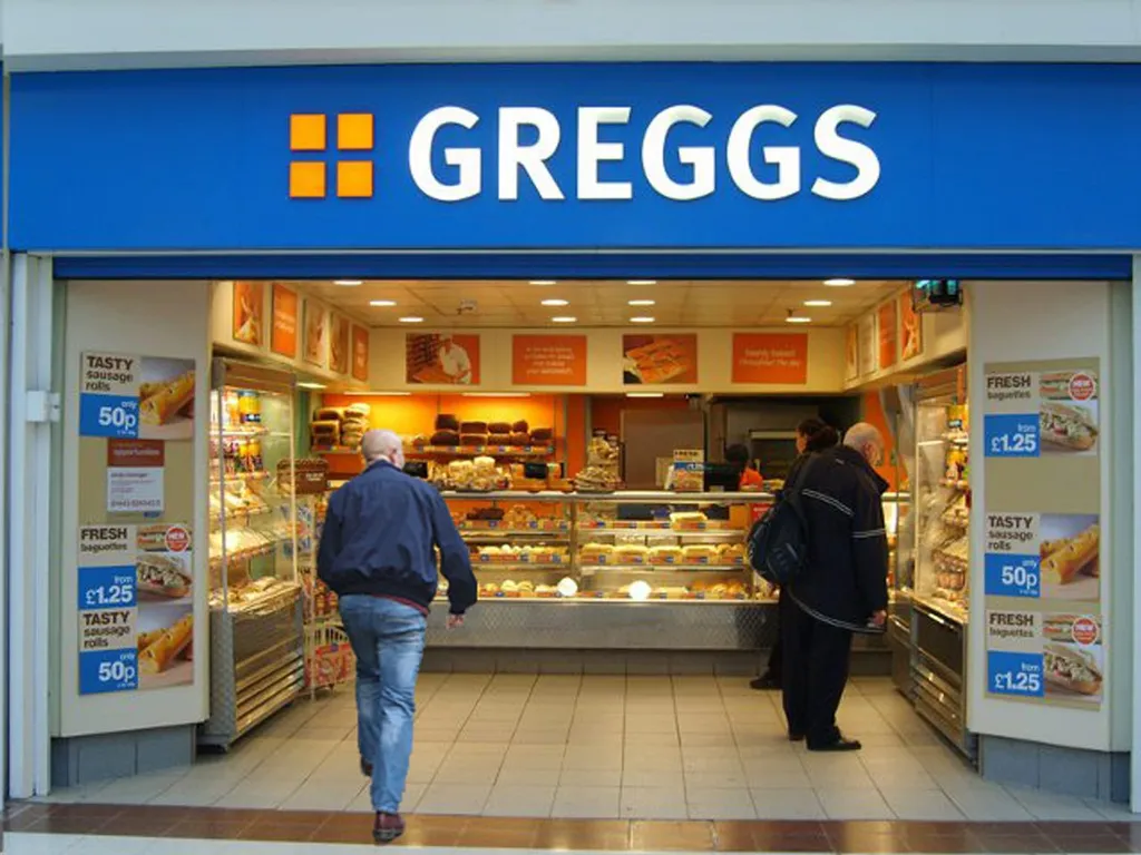 Greggs bakery shopfront with the Greggs sign above the entrance