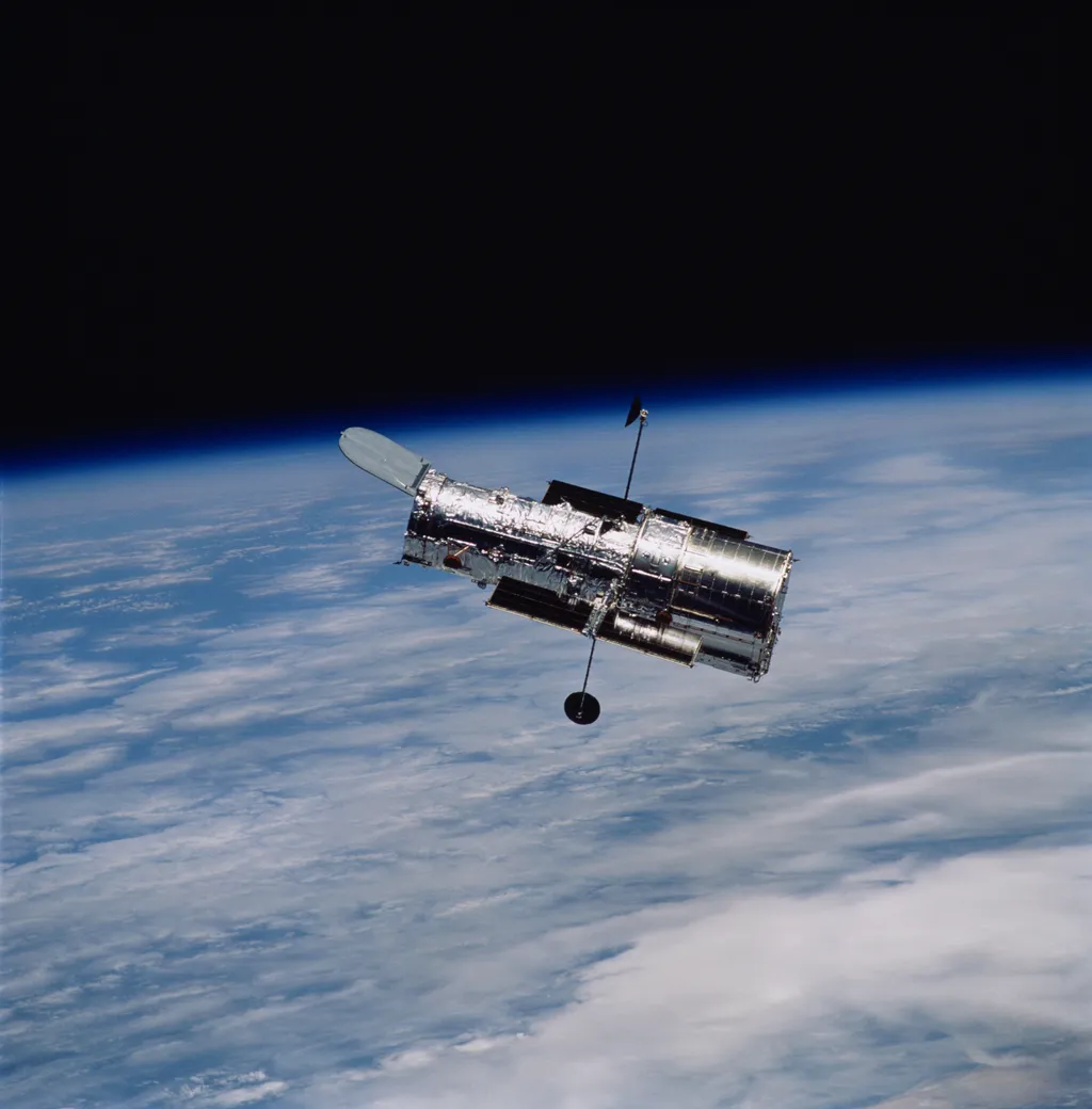 The Hubble Space Telescope in orbit above Earth's atmosphere