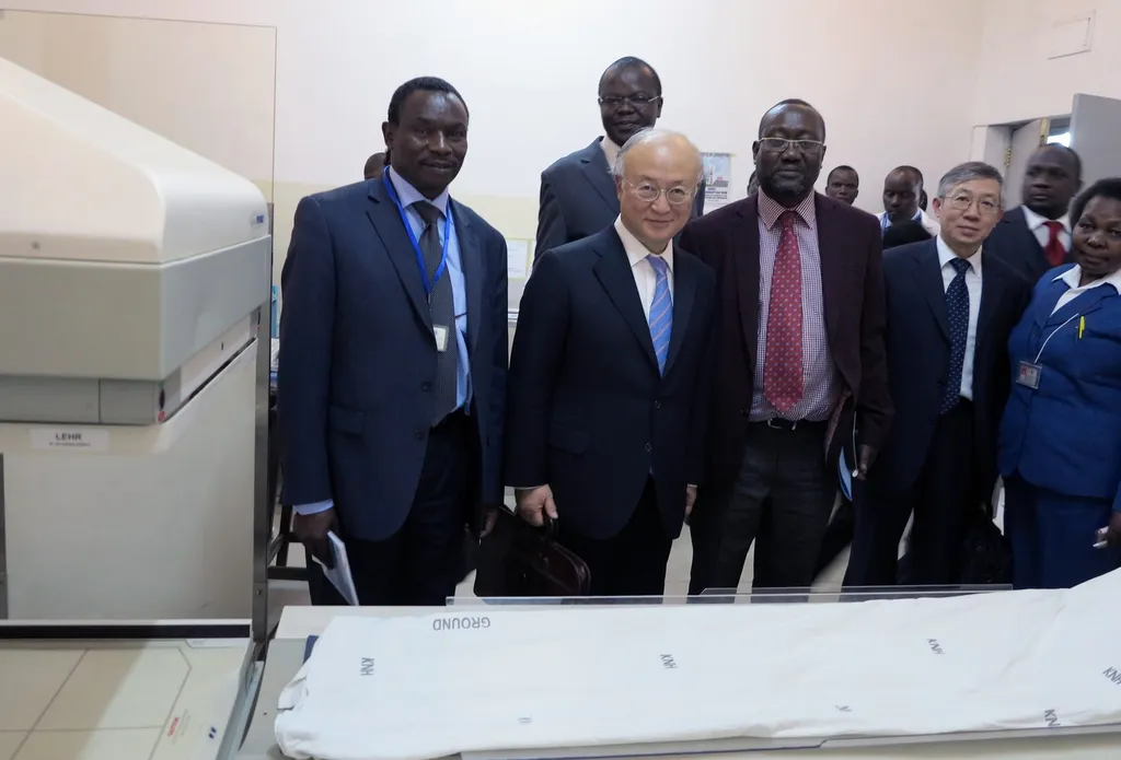 IAEA Director General Yukiya Amano and hospital officials during a visit to a ward at Kenyatta National Hospital in Nairobi, December 2013