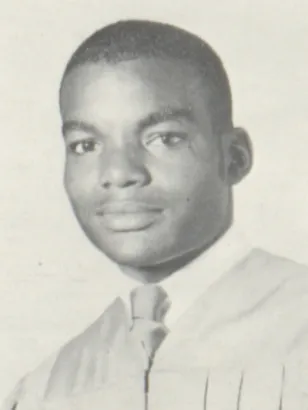 Portrait of a young Lawrence McCutcheon in graduation robes, circa 1968.