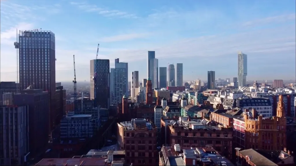 Manchester city centre skyline; PEAK:AIO is headquartered in Manchester